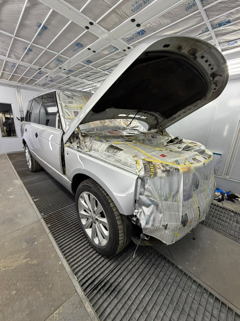 Resprayed car body panel finished to factory standard